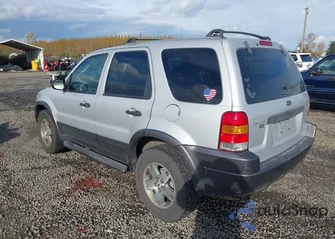 2003 Ford Escape Xlt z USA, uszkodzony, nr VIN 1FMCU93113KA90810